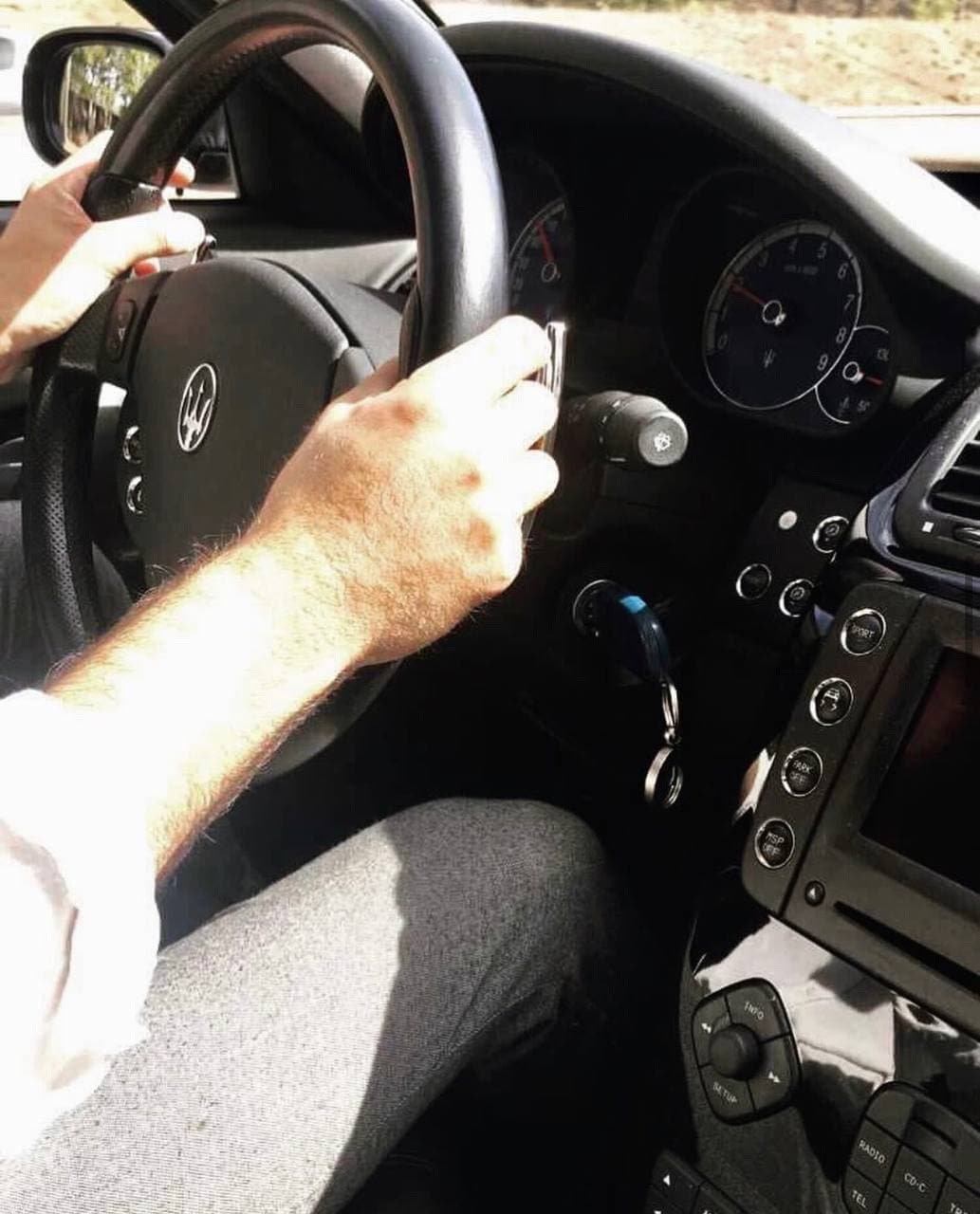 View from the driver seat of a Maserati