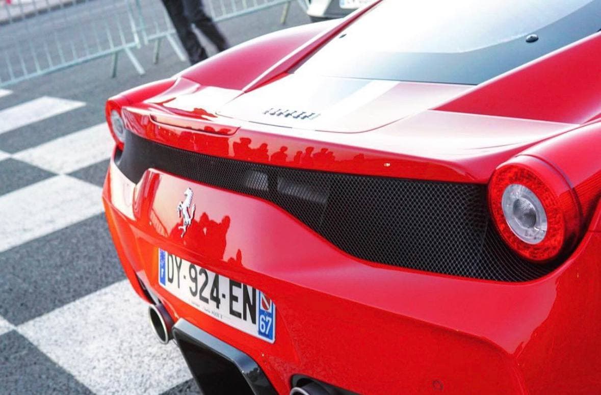 Close view of the rear of a red Ferrari